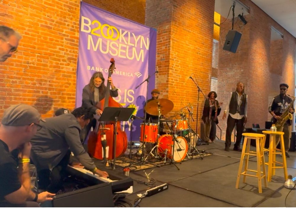 Ahmed Abdullah&rsquo;s Diaspora performing at the Brooklyn Museum, with D.D. Jackson leaning over a keyboard that has dropped to the floor